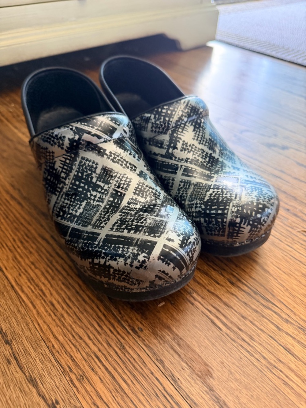 Dansko Black and White Patterned Clogs
